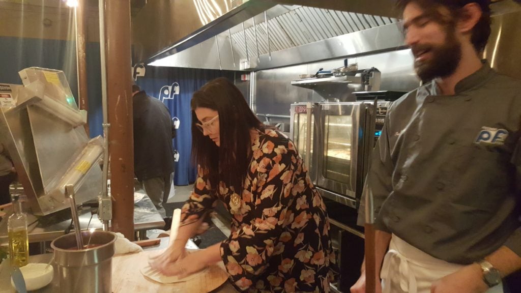 Rebecca makes a pizza